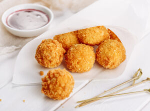 Deep,Fried,Mozzarella,Cheese,Ball,Cranberry,Sauce.,Mashed,Potato,Balls