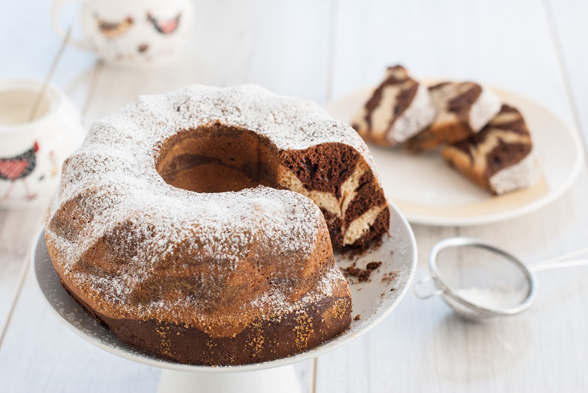 Marble,Bundt,Cake,With,Power,Sugar,And,Easter,Eggs,On