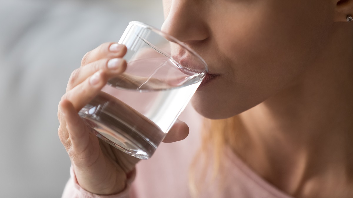 Close,Up,Cropped,Image,Thirsty,Woman,Holding,Glass,Drinks,Still