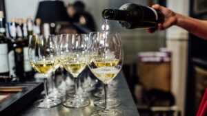 Waiter,Brings,Glasses,Of,Champagne,And,Tray