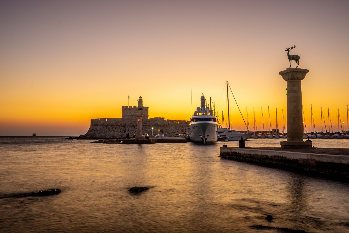 Windmills,At,Mandraki,Harbour,In,Rhodes,Island,Greece