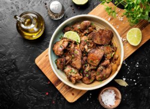 Fried,Chicken,Liver,With,Onions,And,Herbs.,Top,View