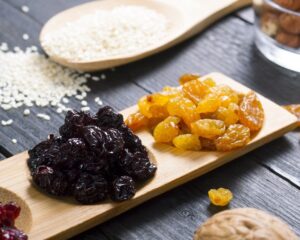 Sun,Dried,Super,Foods,,Nuts,And,Cereals,On,Black,Wood