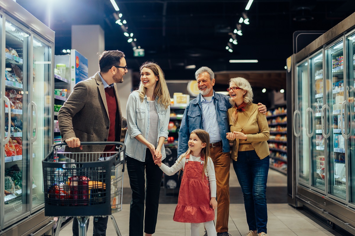 Multigeneration,Family,Shopping,Together,At,Supermarket.,Grandparents,,Parents,And,Adorable