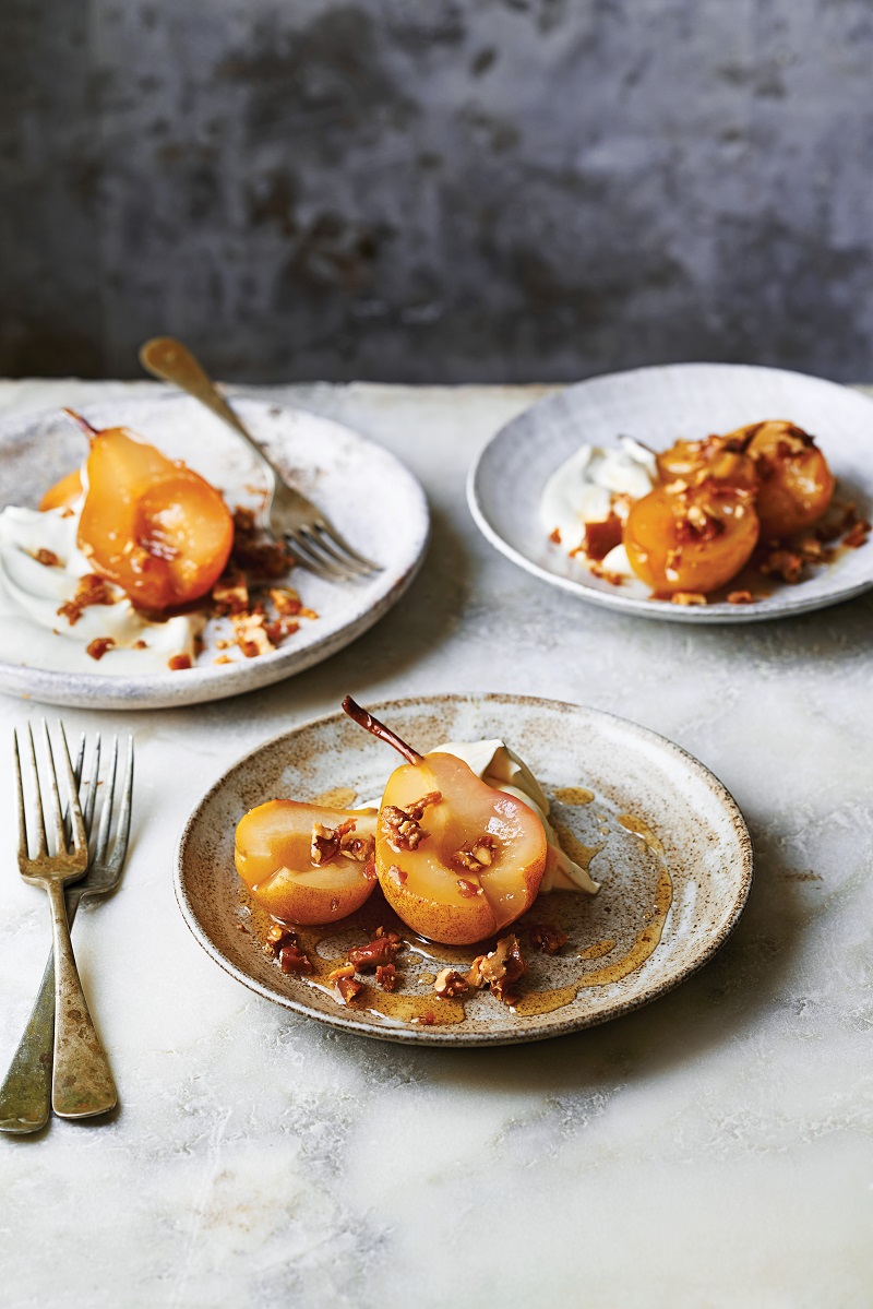 Pears poached in perry with chantilly cream and candied walnuts