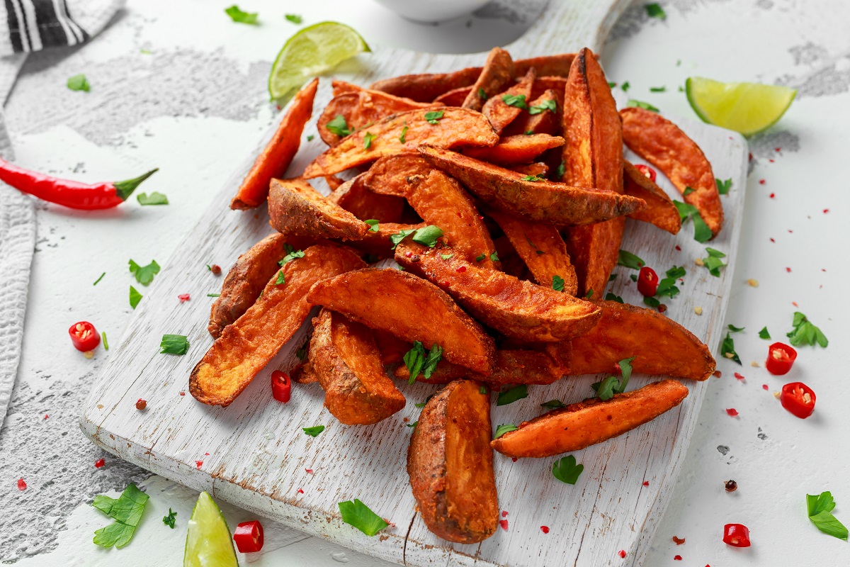 Healthy,Homemade,Baked,Orange,Sweet,Potato,Wedges,With,Fresh,Cream