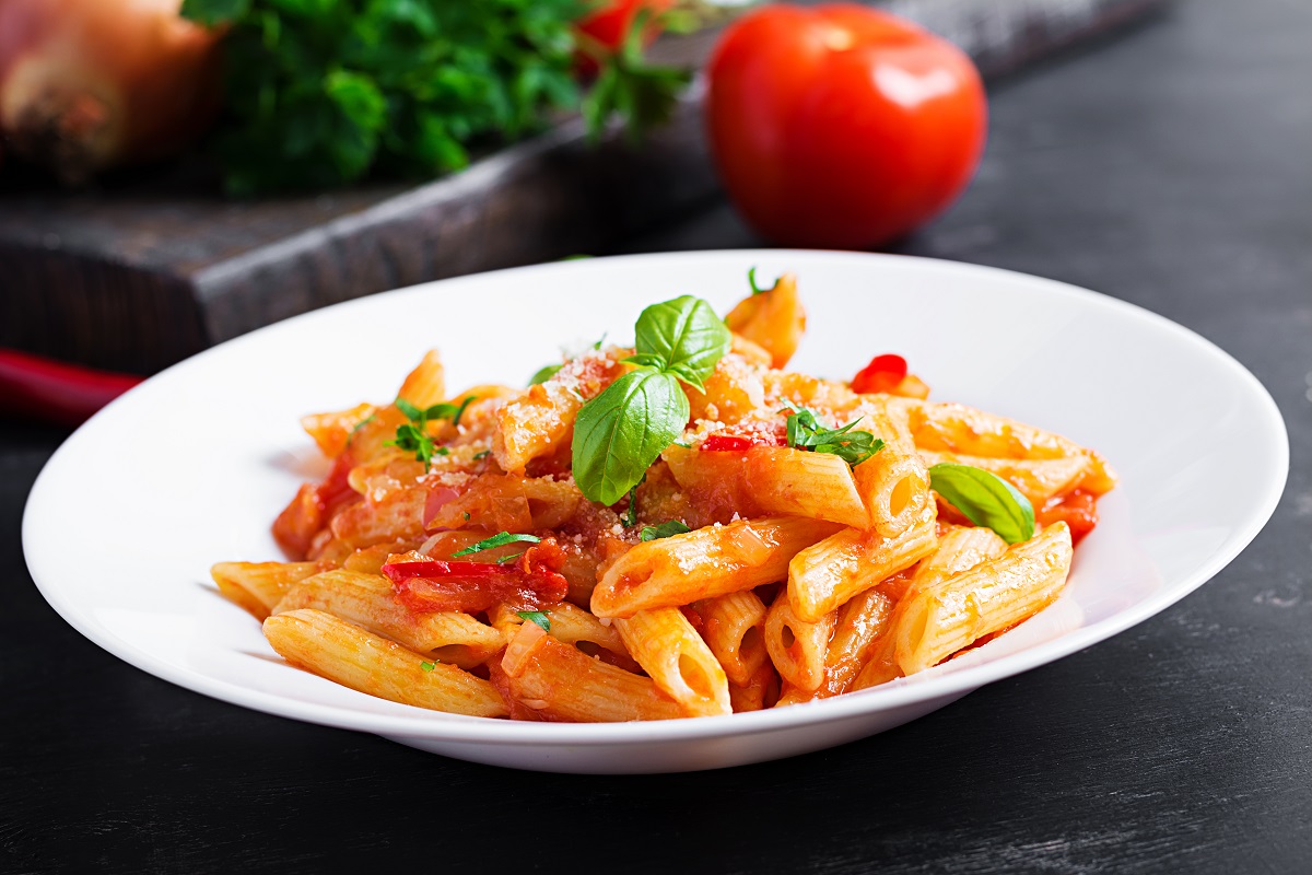 Classic,Italian,Pasta,Penne,Alla,Arrabiata,With,Basil,And,Freshly
