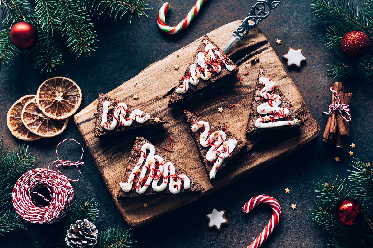 Chocolate,Brownies,With,Candy,Canes,And,Christmas,Decorations,On,Dark