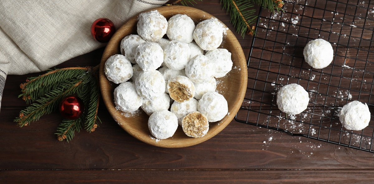 Flat,Lay,Composition,With,Christmas,Snowball,Cookies,On,Wooden,Table,