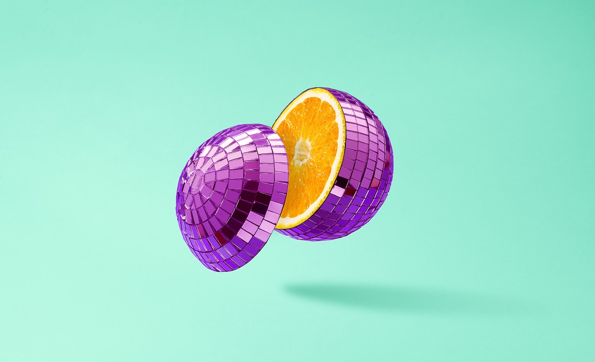 Cut,Disco,Ball,As,An,Orange,,Floating,In,The,Air