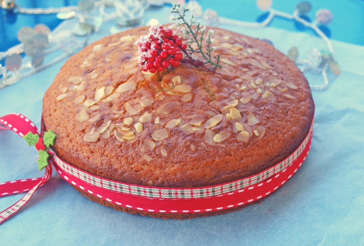Homemade,Greek,Vasilopita,Decorated,With,Almond,Slivers,And,Ribbons