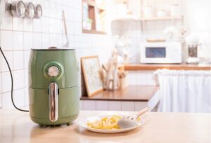 Air,Fryer,Machine,Cooking,Potato,Fried,In,Kitchen.,Lifestyle,Of