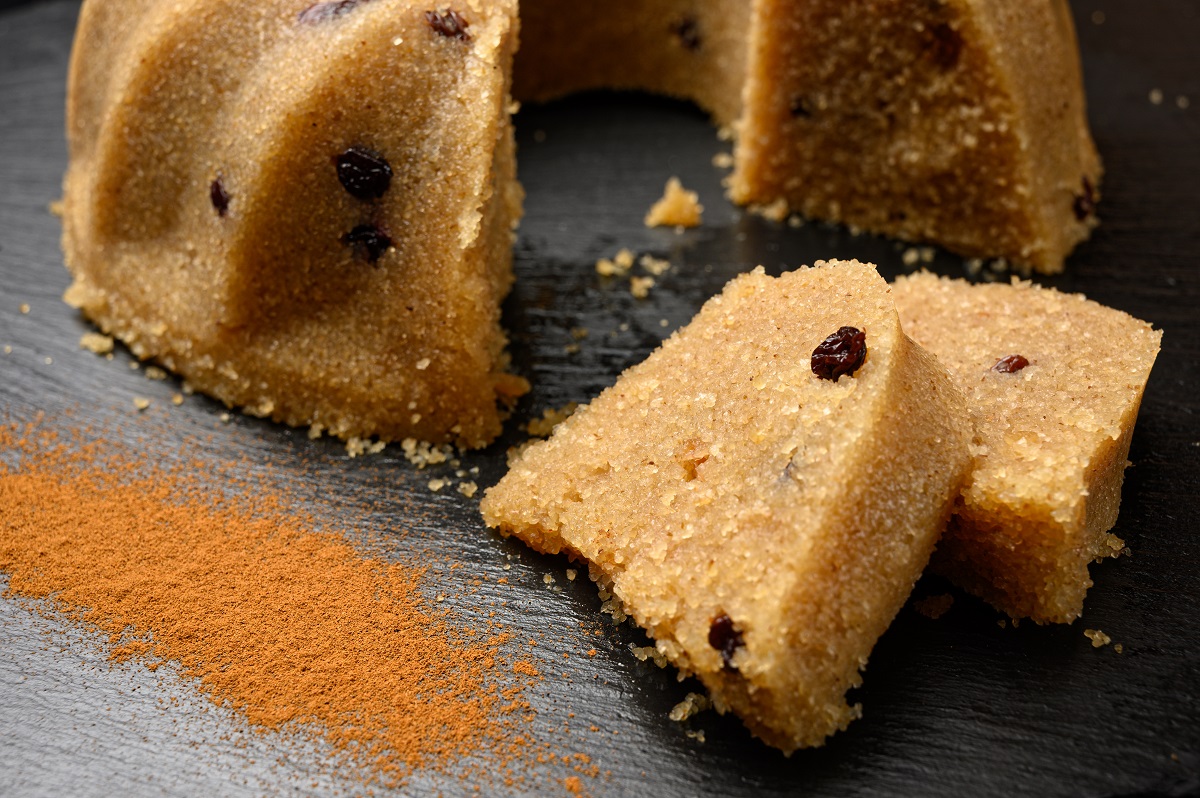 Homemade,Semolina,Halva,With,Raisins,And,Cinnamon,Served,On,Black