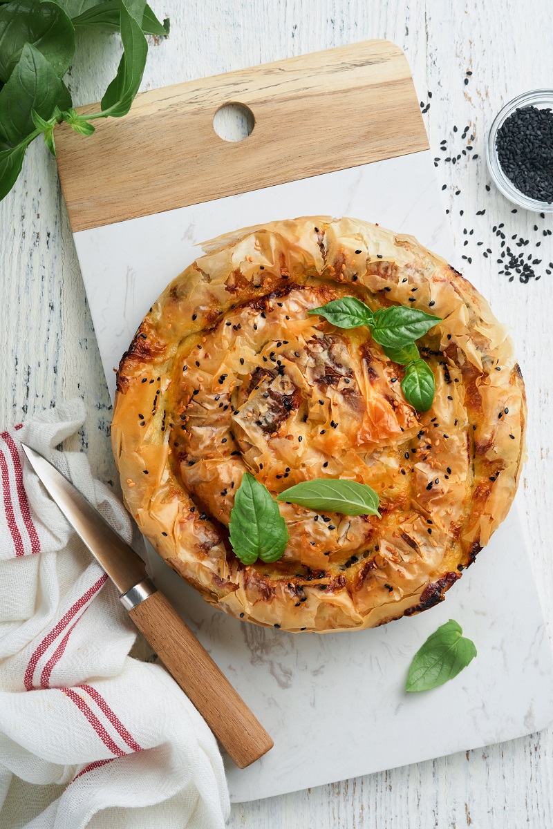 Delicious,Pie,Spanakopita,With,Soft,Feta,Cheese,And,Spinach,On