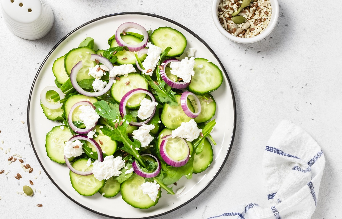 Feta,Red,Onion,Cucumber,Salad.,Space,For,Text,,Top,View.