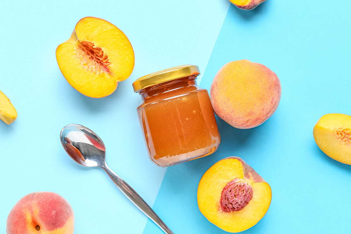 Composition,With,Glass,Jar,Of,Sweet,Peach,Jam,And,Fresh