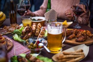 Bbq,Dinner,With,Meat,,Salads,,Cooked,Vegetables,And,Drinks.