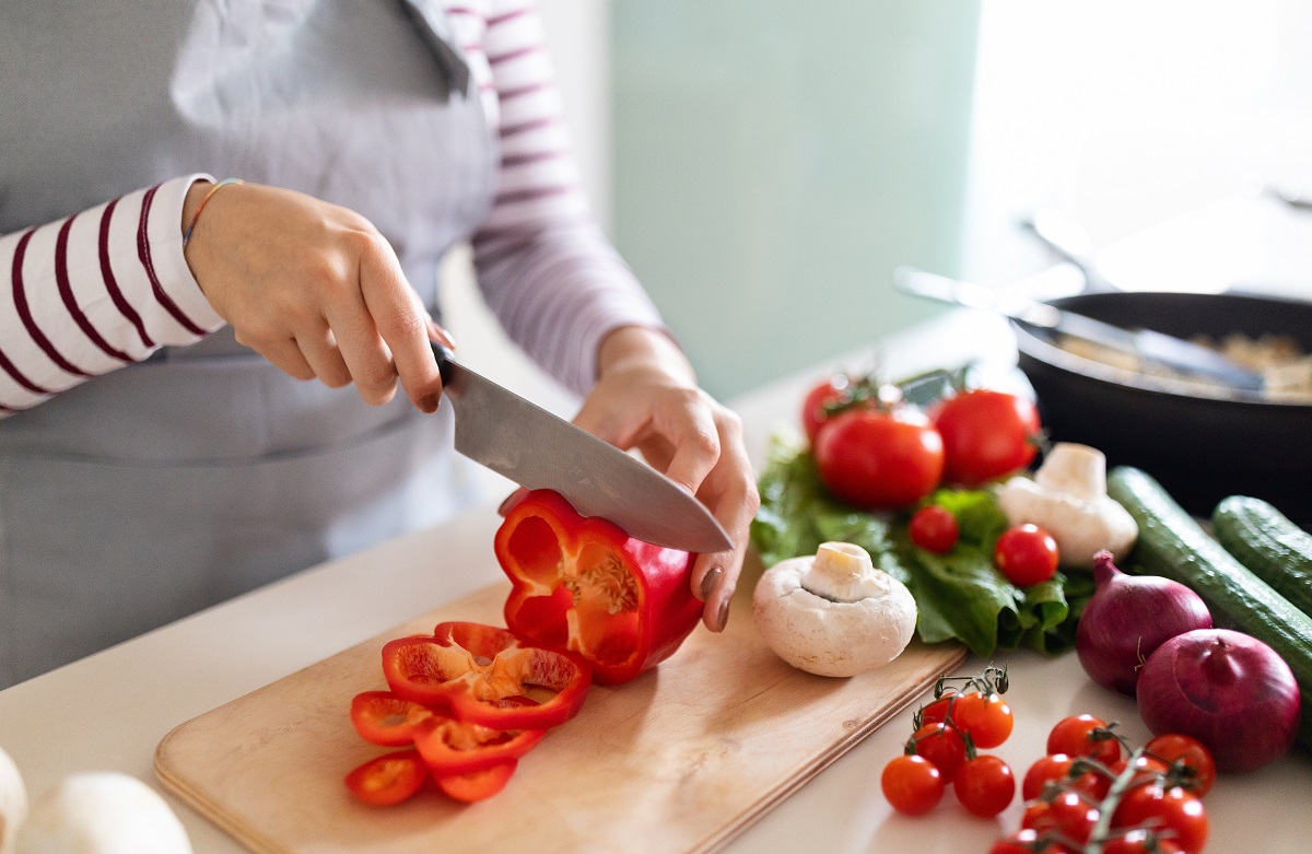 Cooking,Concept.,Unrecognizable,Woman,In,Grey,Apron,Making,Healthy,Dinner,