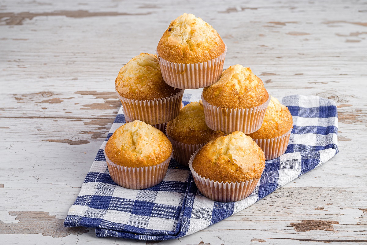 A,Pile,Of,Muffins,On,A,Kitchen,Towel