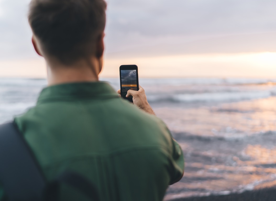 Back,View,Of,Crop,Unrecognizable,Male,Tourist,Blogger,Taking,Photo