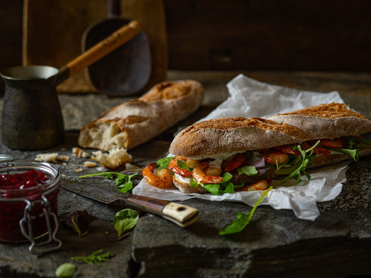 French,Baguette,Filled,With,Shrimp,And,Mayonnaise,With,Green,Salad