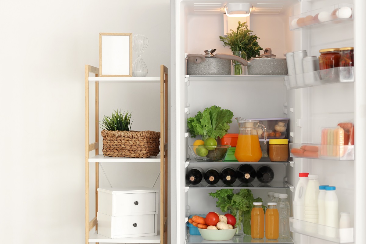 Different,Fresh,Products,In,Open,Fridge,In,Kitchen