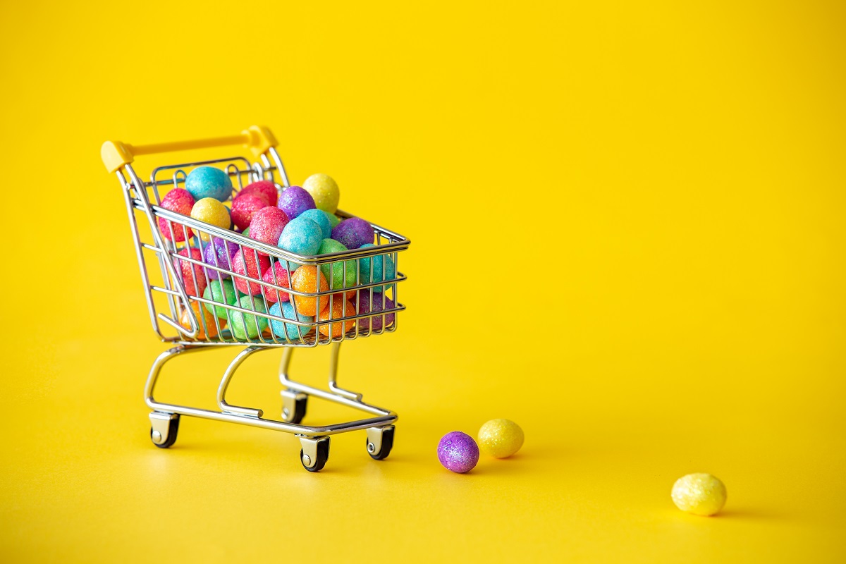 Happy,Easter.shopping,Cart,With,Colorful,Glitter,Easter,Eggs,On,The