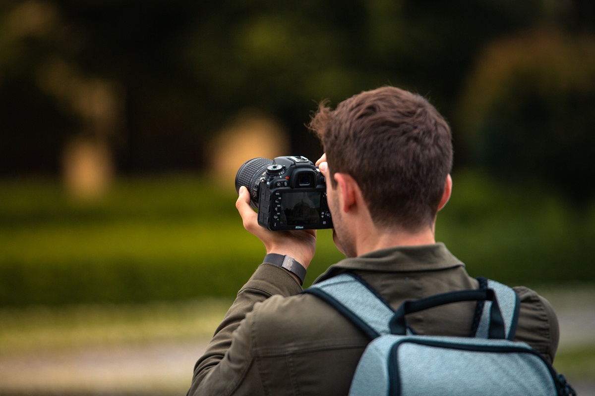 Munich,,Germany,-,June,23,,2019:,Handsome,Guy,Taking,Photos