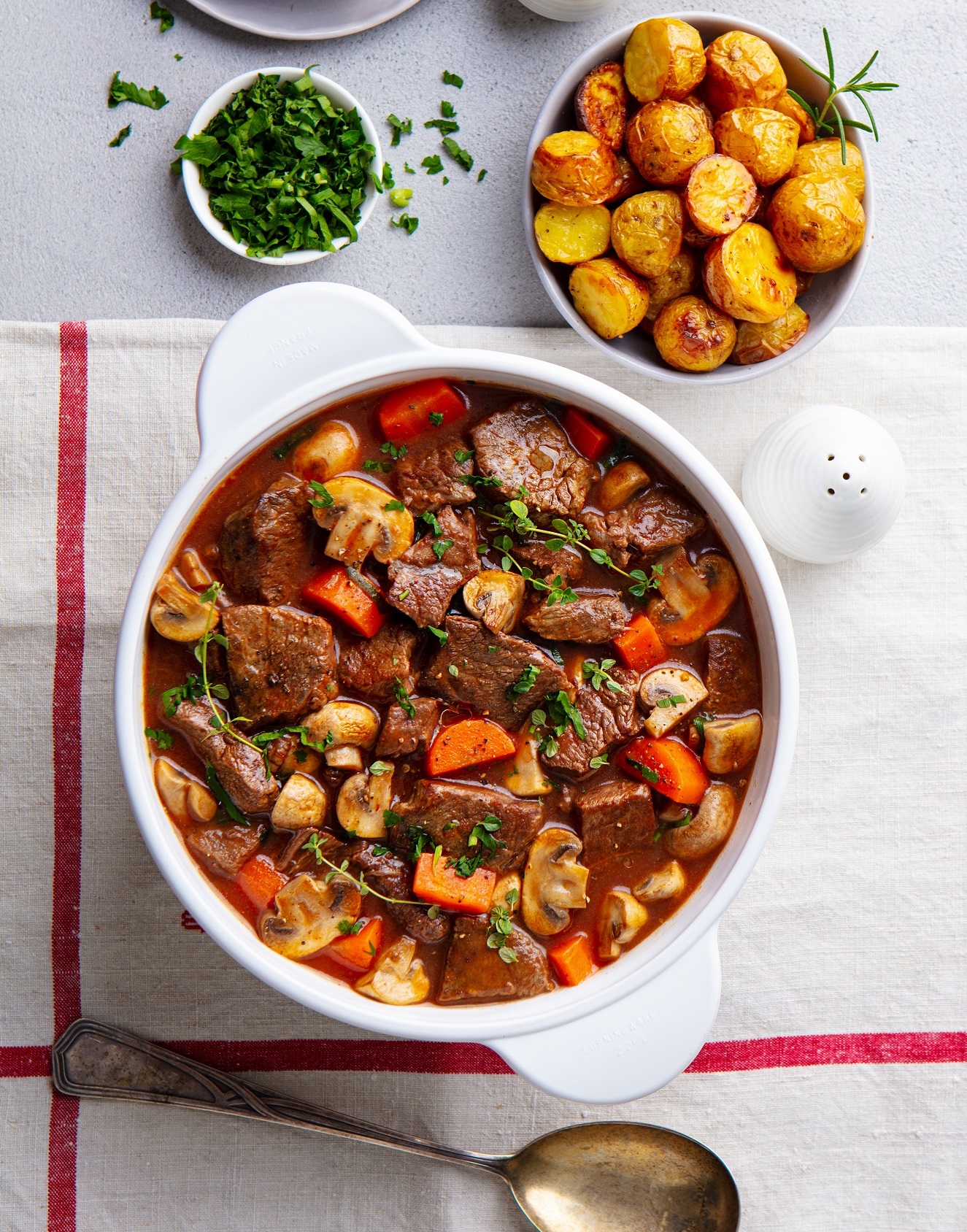 Beef,Bourguignon,Stew,With,Vegetables.,Grey,Background.,Top,View.