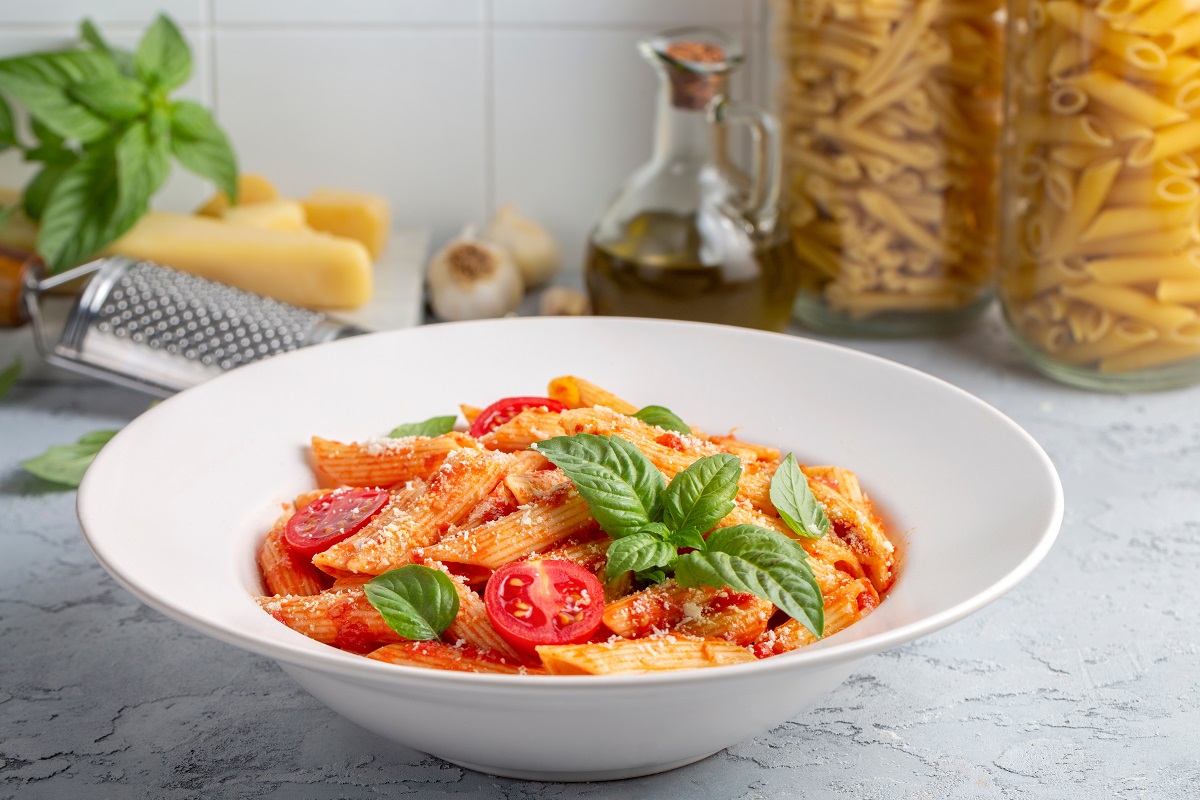 Classic,Italian,Pasta,Penne,Alla,Arrabiata,With,Basil,And,Freshly