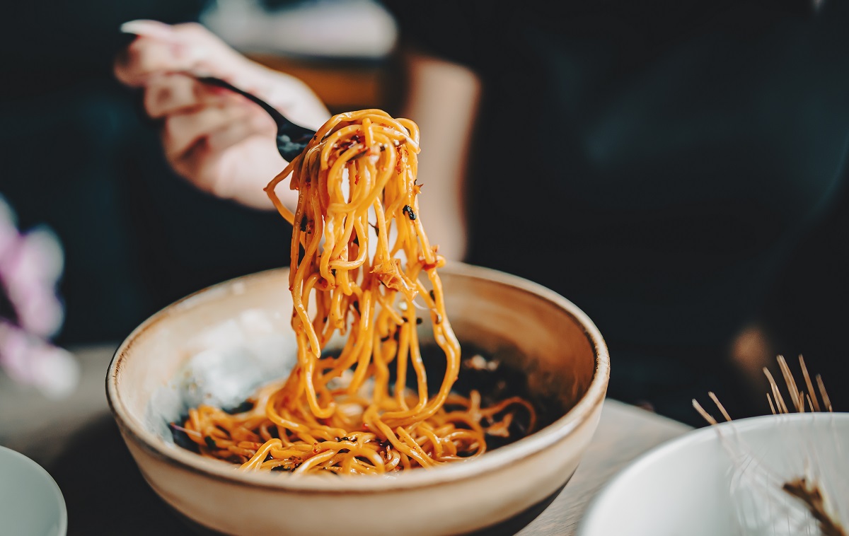 Italian,Food.,Woman,Hand,Holding,Fork,With,Spaghetti,Bolognese,Sauce