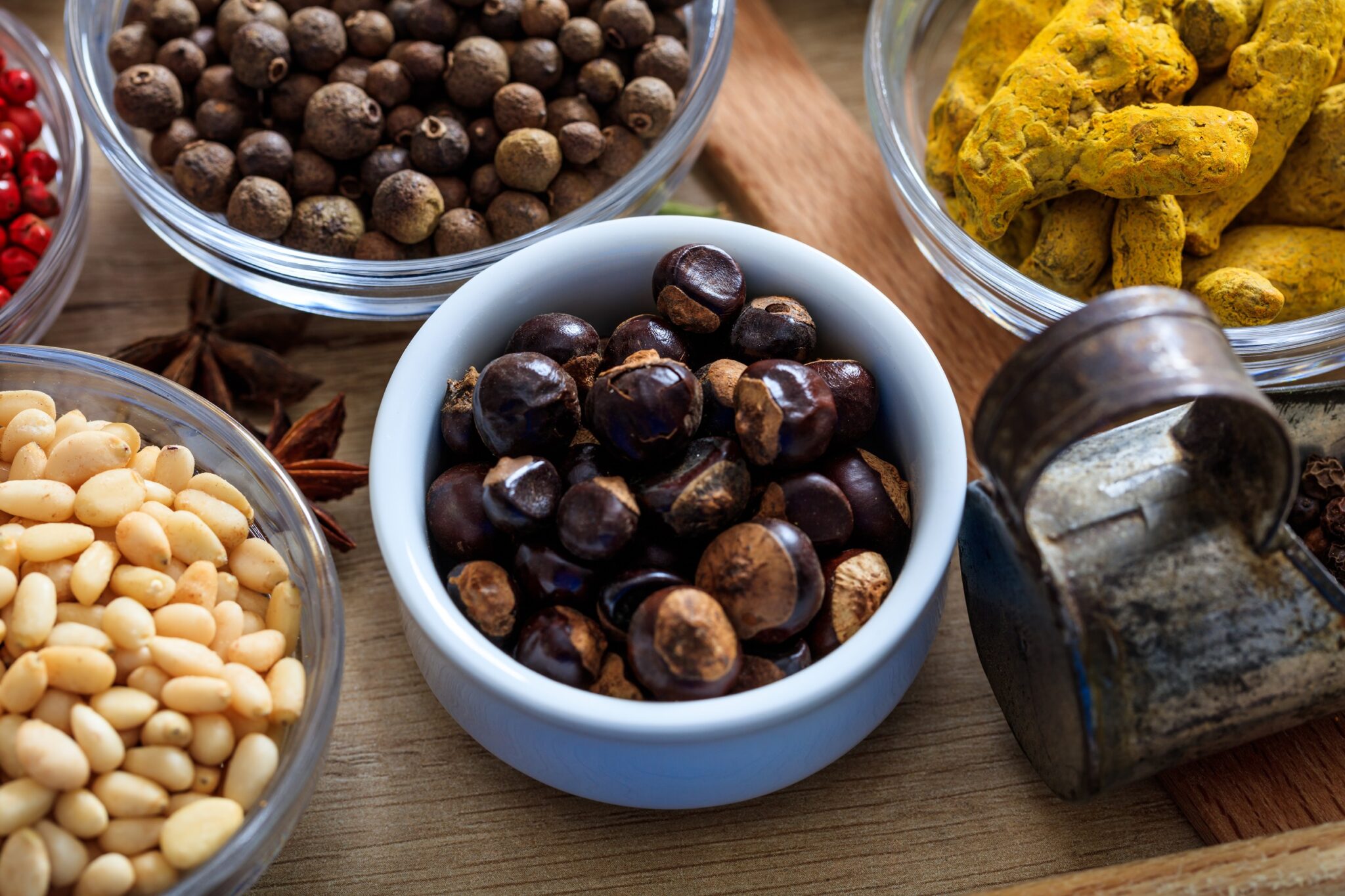 Star,Anise,And,Other,Spices,On,A,Wooden,Surface