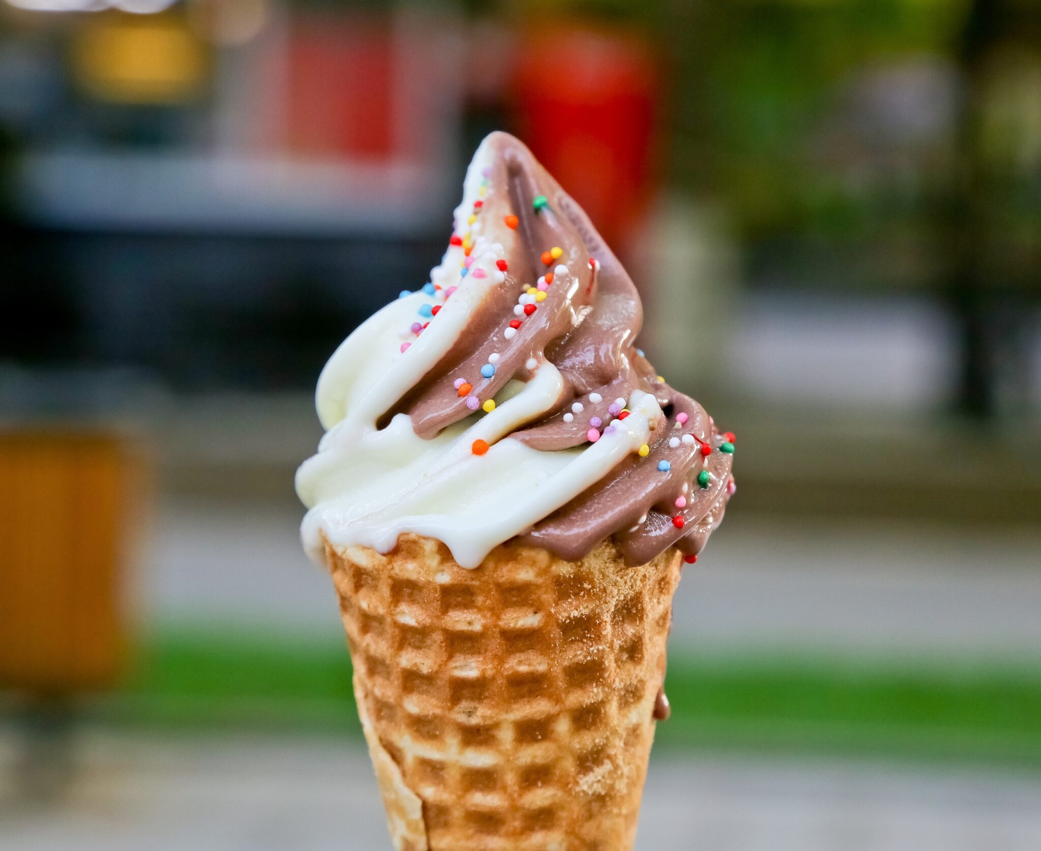 Ice,Cream,In,A,Waffle,Cup,On,A,Blurred,Background,