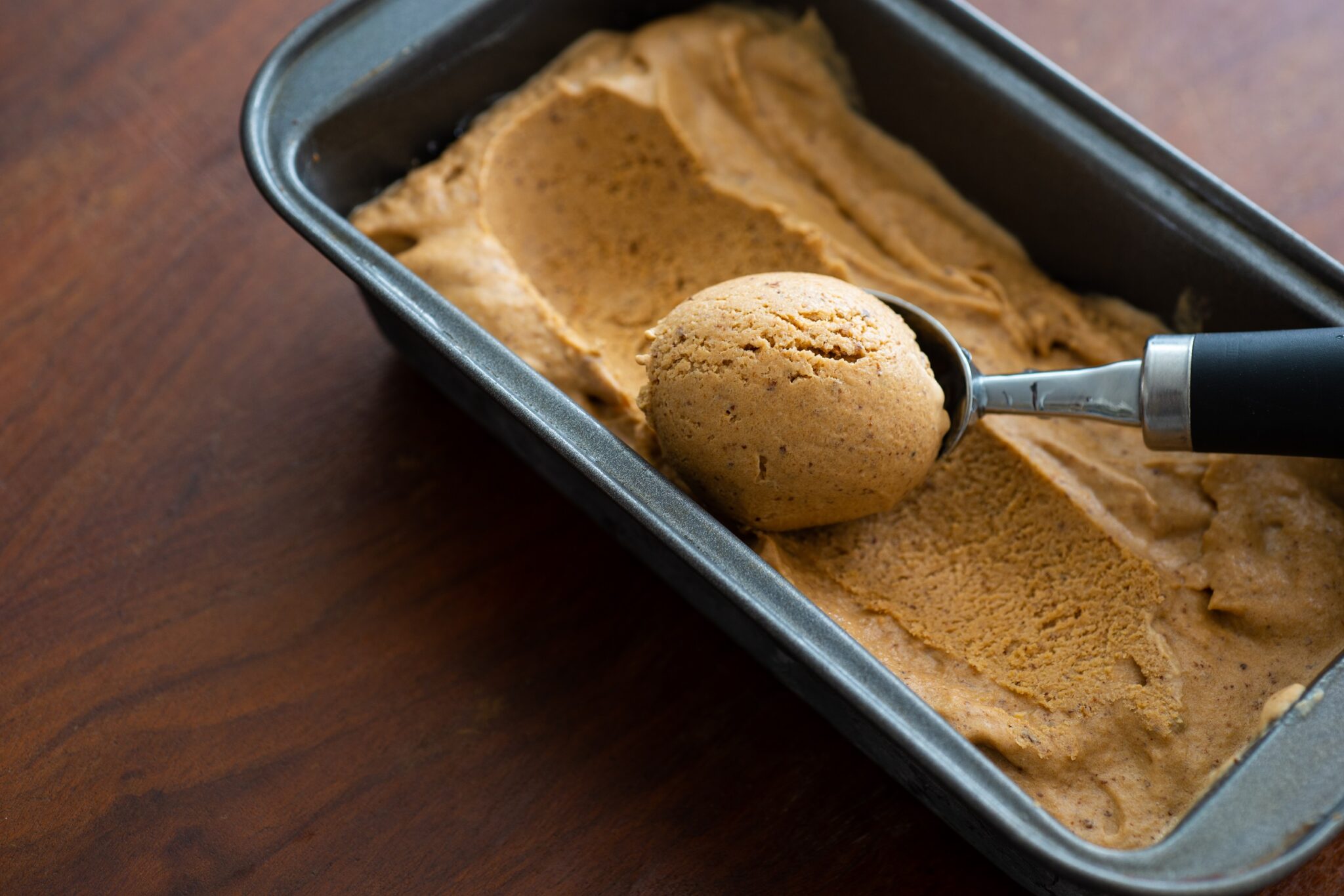 Scooping,Homemade,Prune,Ice,Cream