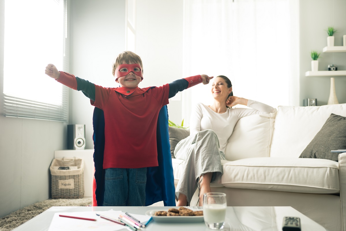 Superhero,Boy,Having,An,Healthy,Snack,With,Cookies,And,Milk