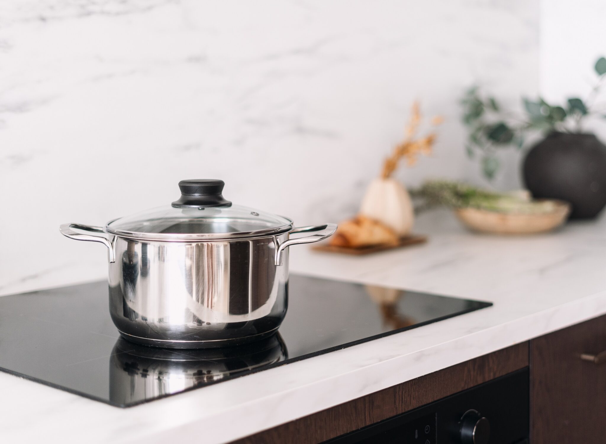 Glass,Ceramic,Stove,With,Metal,Pot.,Close,Up,View,Of