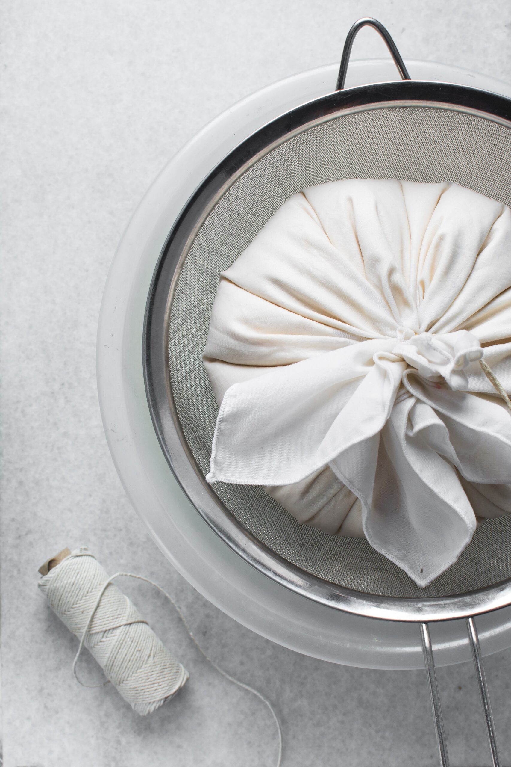 Tied,White,Cotton,Cloth,With,Greek,Yogurt,Inside,,Process,Of