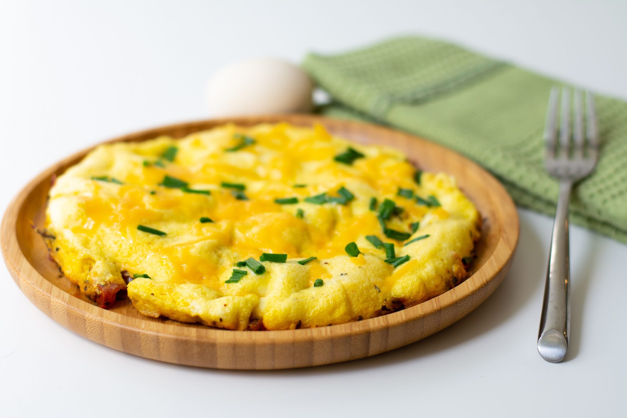 Fluffy,Omelette,From,Whipped,Eggs,With,Cheddar,Cheese,And,Green