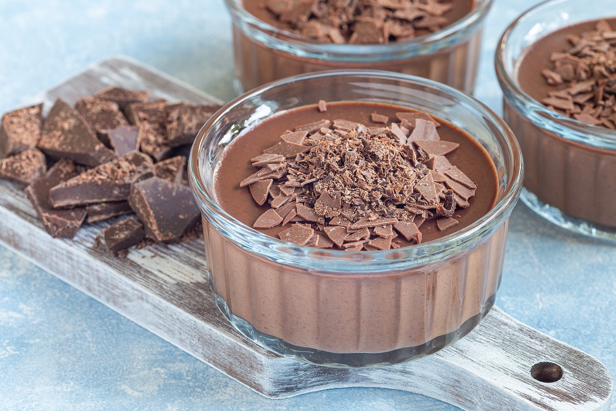 Chocolate,Panna,Cotta,Dessert,In,Glass,Ramekin,,Wooden,Board,And