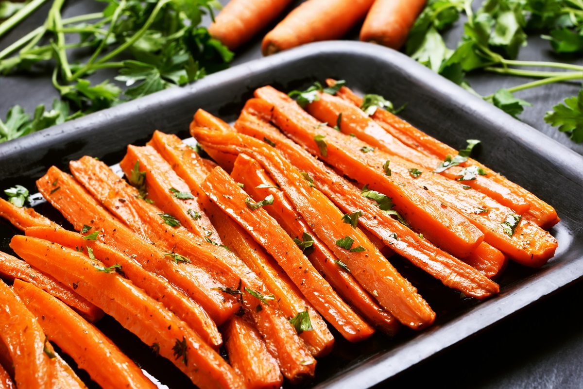 Fried,Carrots,With,Green,Herbs,In,Baking,Tray,,Close,Up