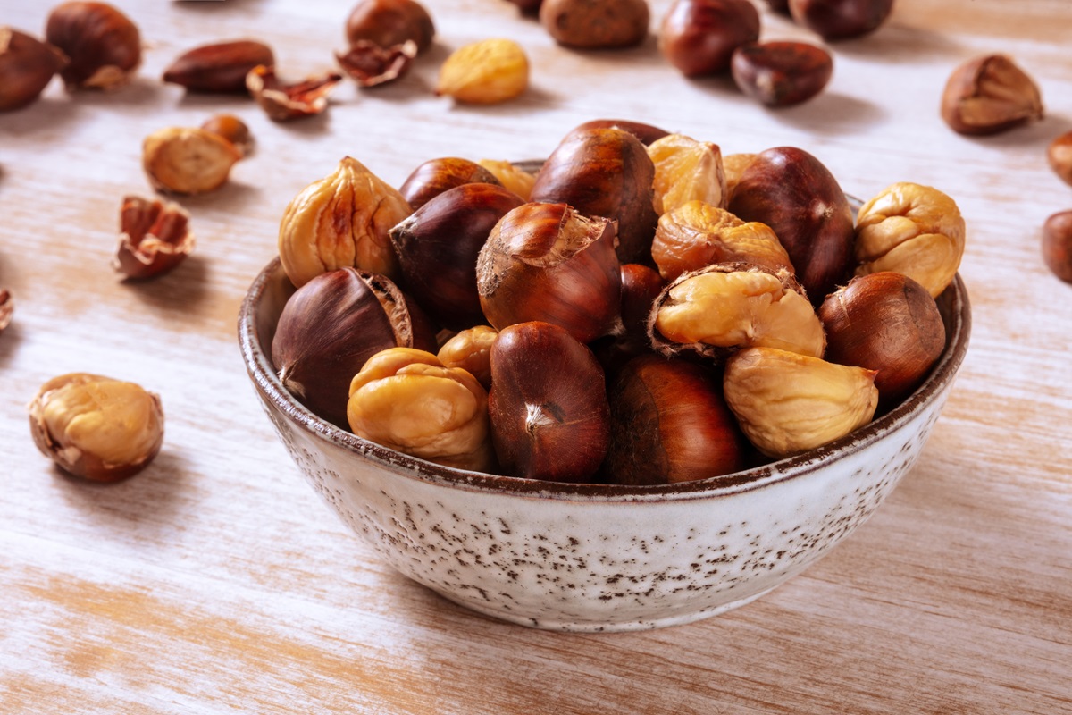 Baked,Chestnuts,In,A,Bowl.,Autumn,Food,On,A,Rustic