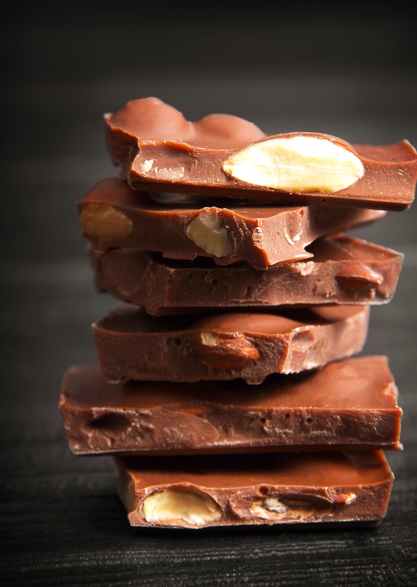 Pieces,Of,Milk,Chocolate,With,Whole,Almonds