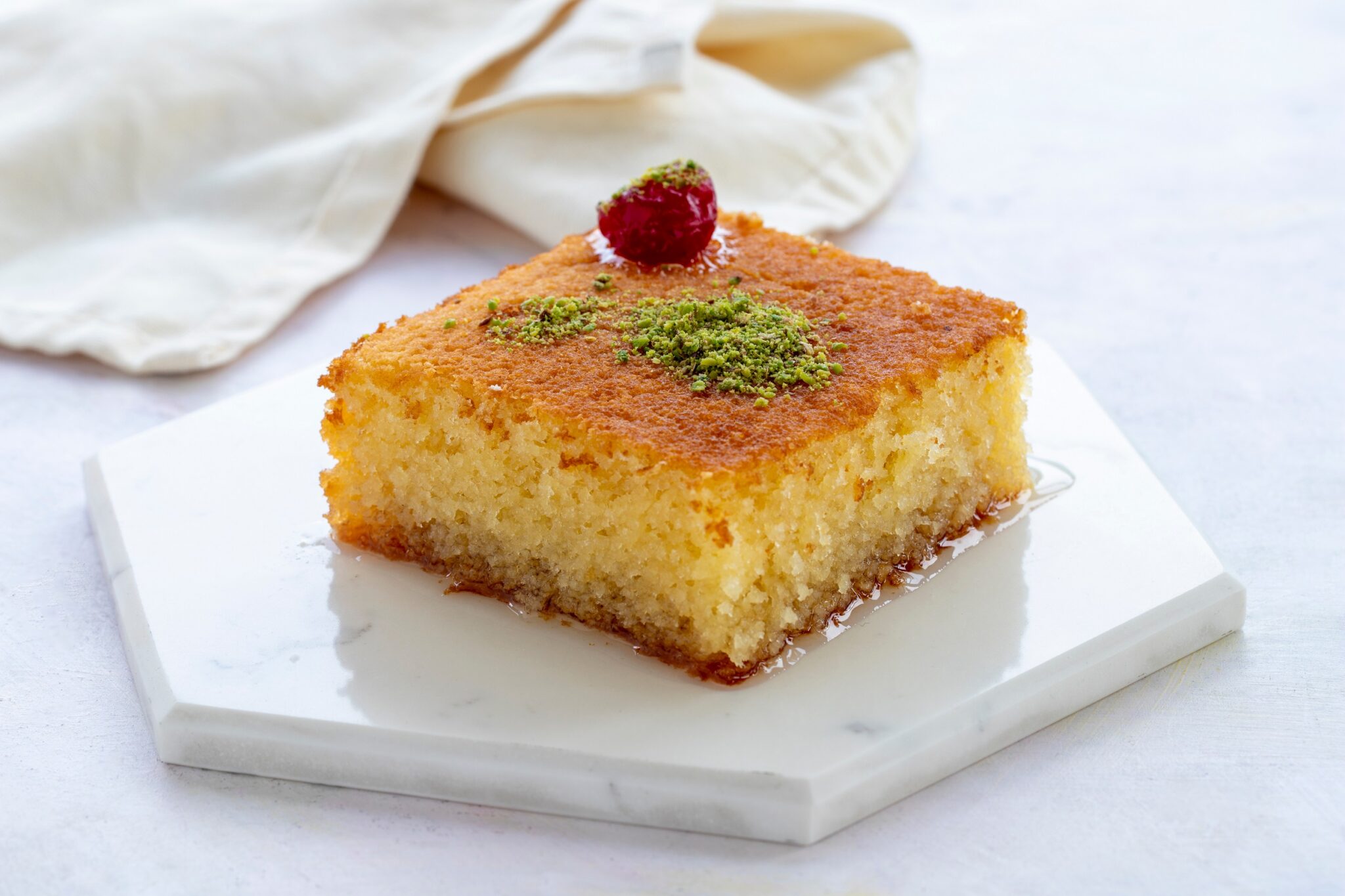 Revani,Dessert,On,A,White,Background.,Traditional,Ramadan,Flavors.,Revani