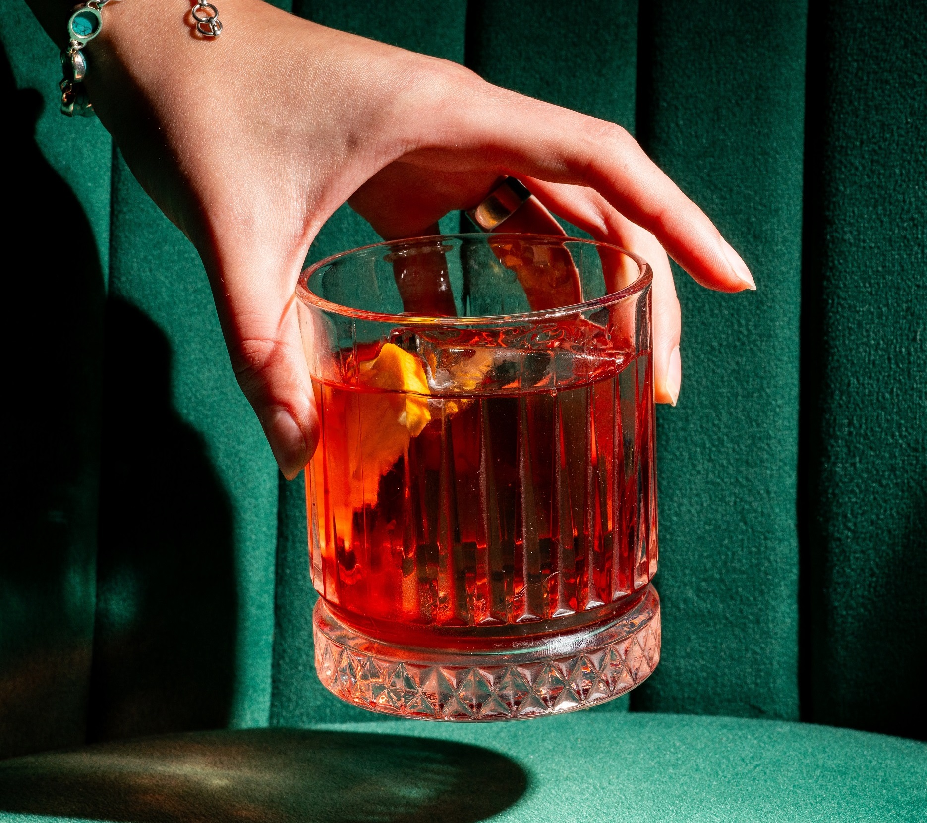 Negroni,Cocktail,With,An,Orange,Peel,Garnish,And,Ice,In