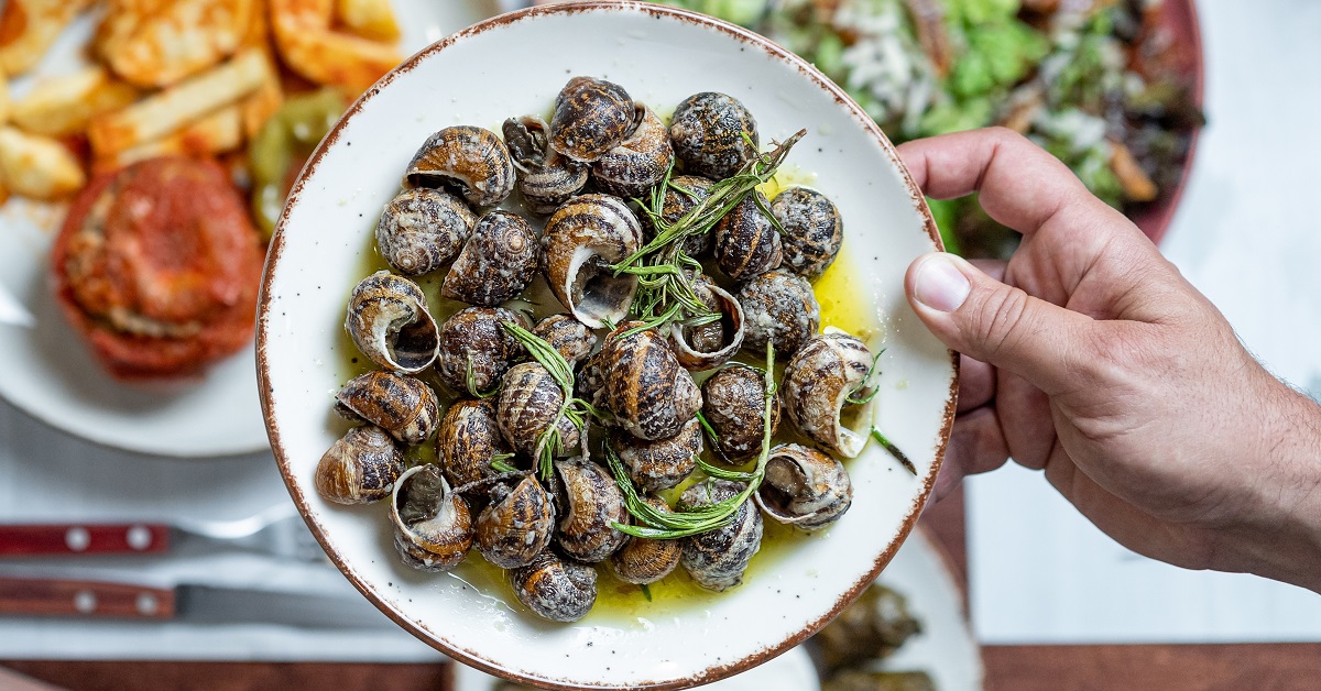 Rustic,Mediterranean,Meal,With,Snails