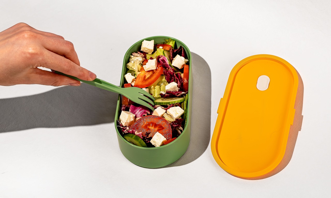 Eating,Vegetarian,Salad,From,Lunch,Box.