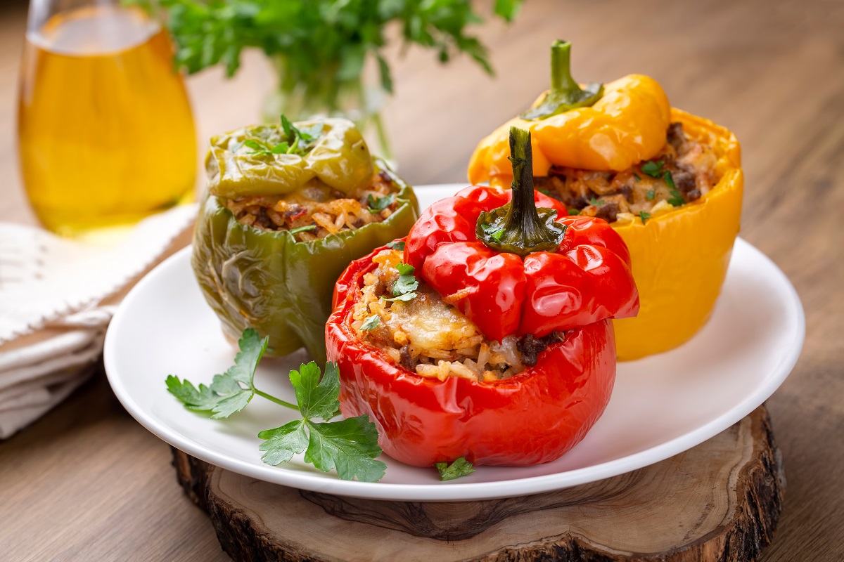 Stuffed,Peppers,,Halves,Of,Peppers,Stuffed,With,Rice,,Dried,Tomatoes,