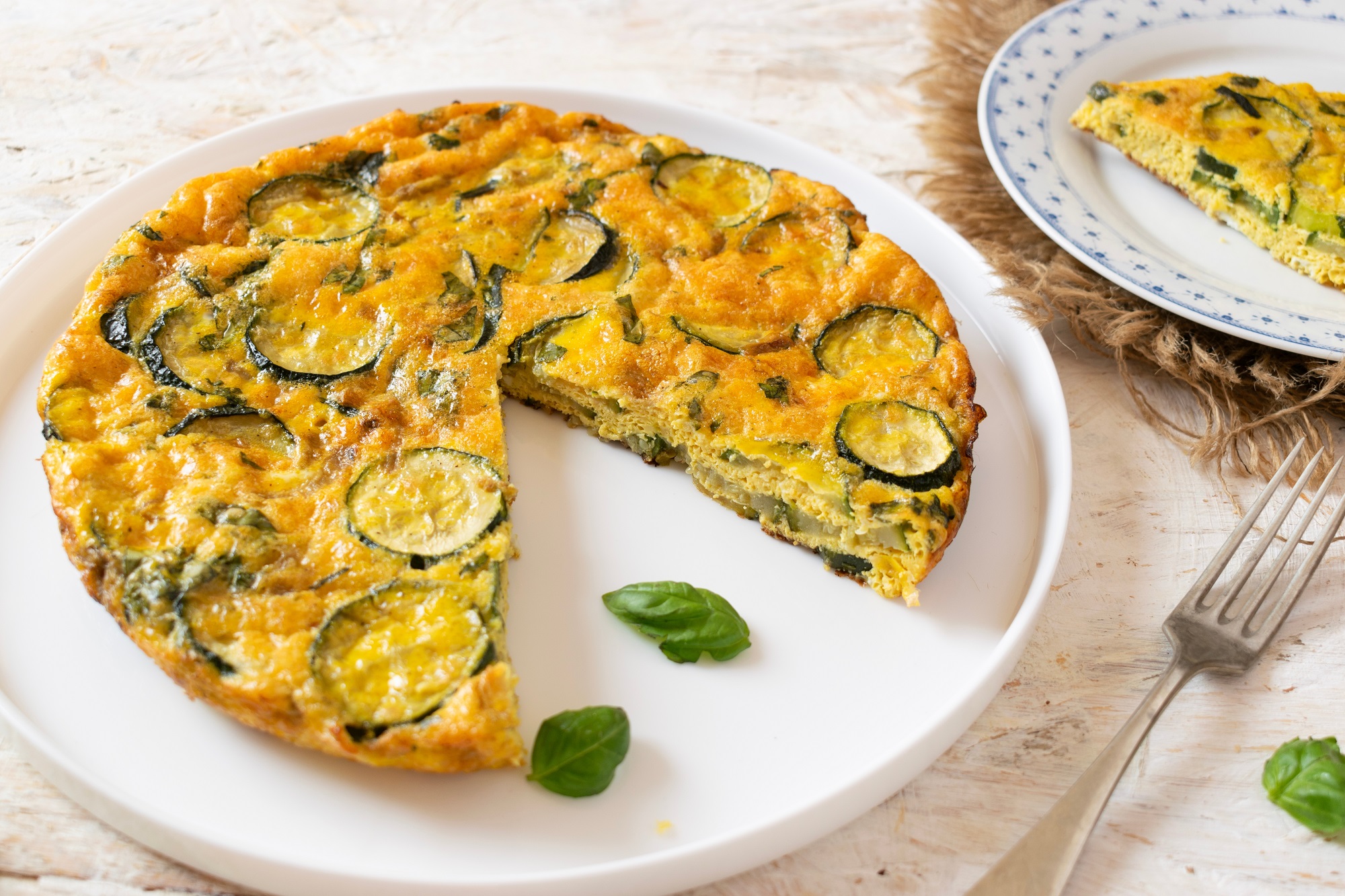 Italian,Zucchini,Frittata,,Sicilian,Omelette,On,White,Background